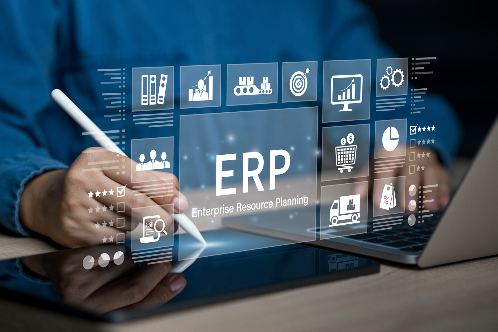 Enterprise resource planning on tablet and laptop